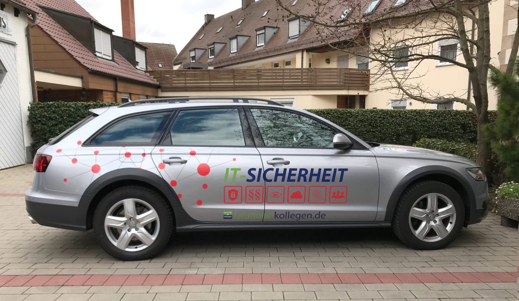 Fahrzeugbeschriftung - Seitenansicht eines silbernen Audi A6 mit neuer Fahrzeugfolierung für Brunner und Schmidt
